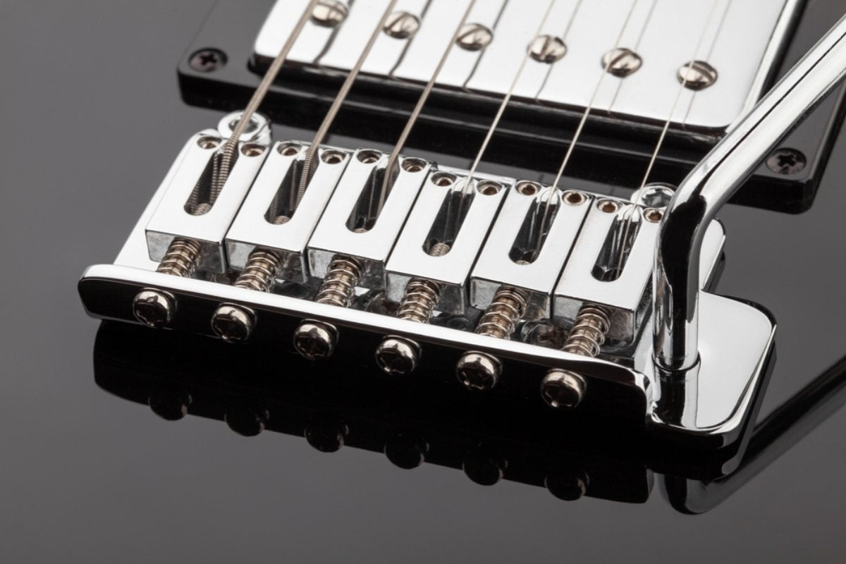 What Are The Considerations When Working With Guitar Bridge?
