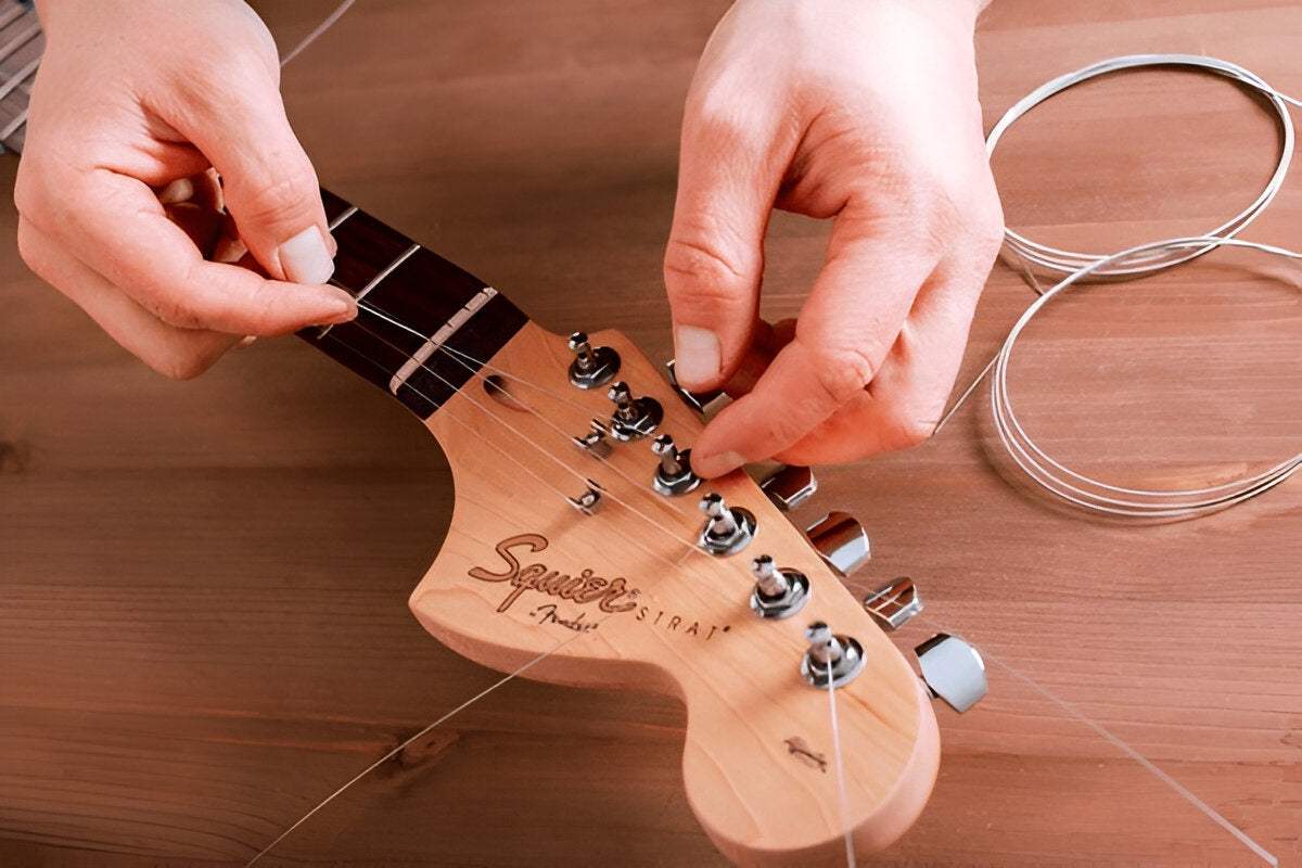 Why Your New Guitar Strings Won’t Stay in Tune & How to Fix It